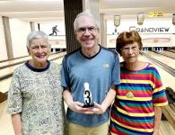 Bingo Game 3rd place; still smiling: Anne Mathisen, Yves Bournival and Lillian Hanson.