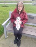 Janet Lawrence with her buddy Sammie, at the beach in Parksville. Sammie is not her own dog but she and a friend get out most days to take him for a walk.