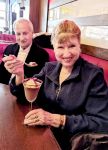 Post bowling at the Apollo restaurant, a surprise birthday dessert for Peggy Oldfield, with Maurice Moses